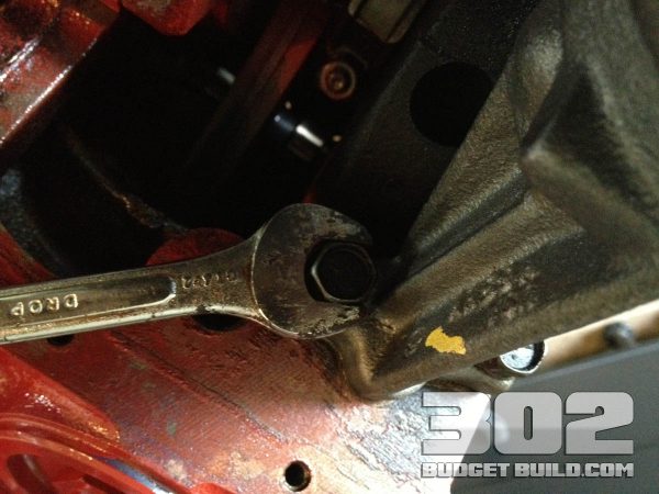 Oil pump mounting bolts shown installed