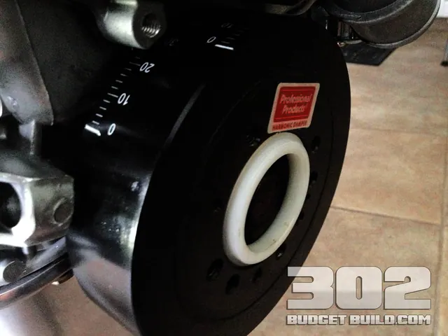 The harmonic damper installed on the front of the 302